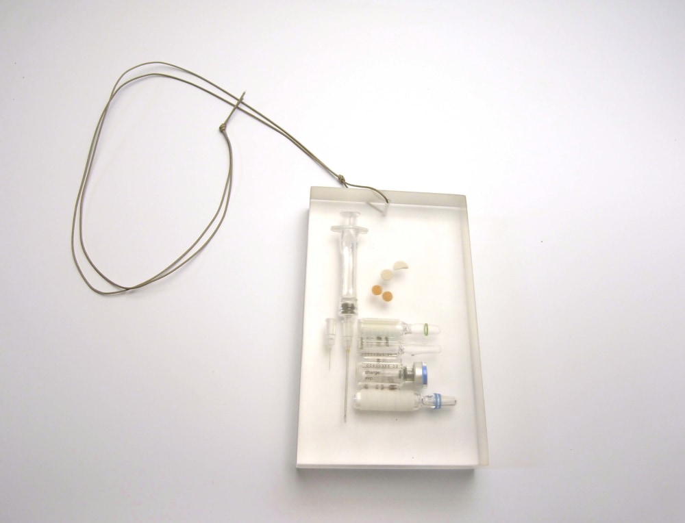 Self Portrait (A daily dose from a chronically diseased man), 2000

pendant, medicine cast in acrylic, nylon wire