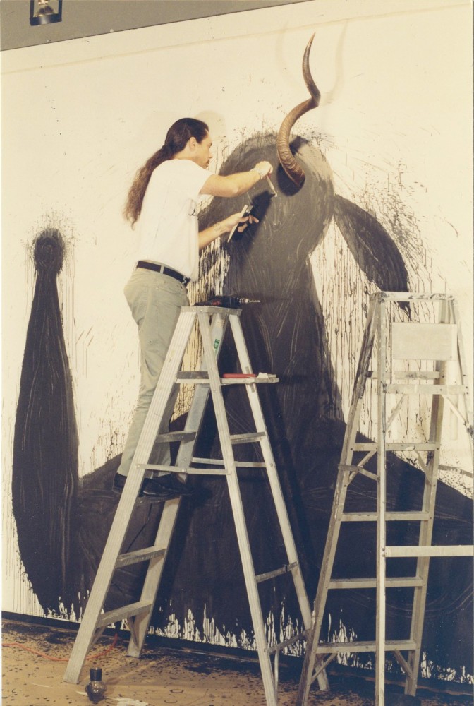 Jose Bedia at work on his installation, Bilongo Negro for his 1994 exhibition at the gallery.

Image courtesy the George Adams Gallery Archives.