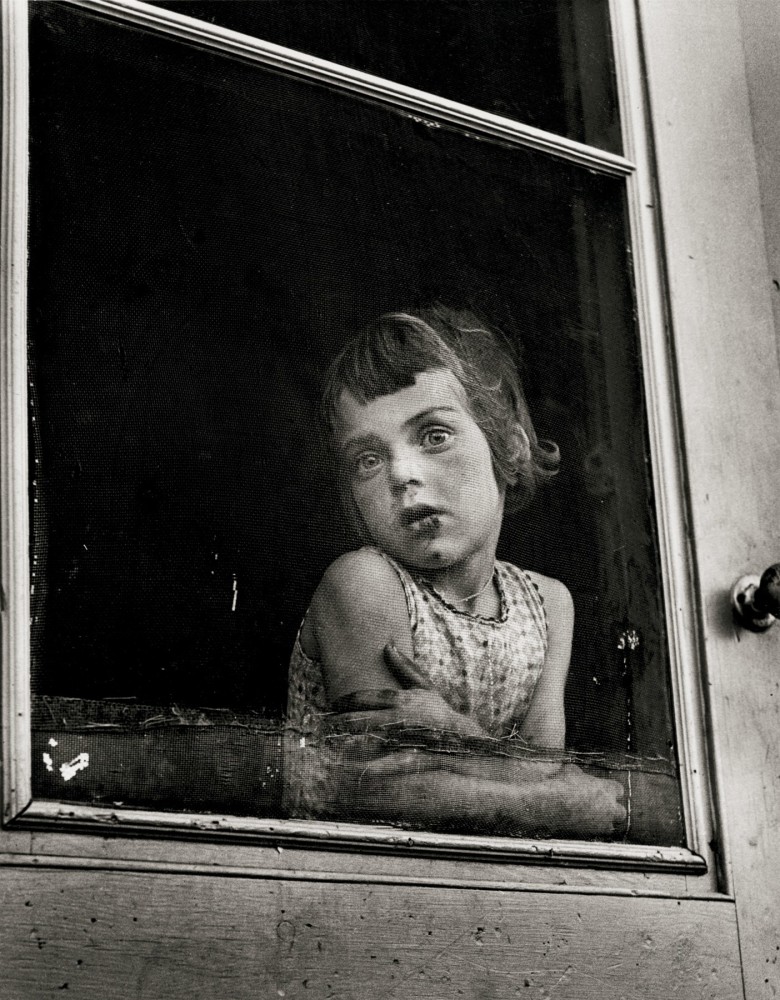 Child Behind Screen Door, Canada, 1956