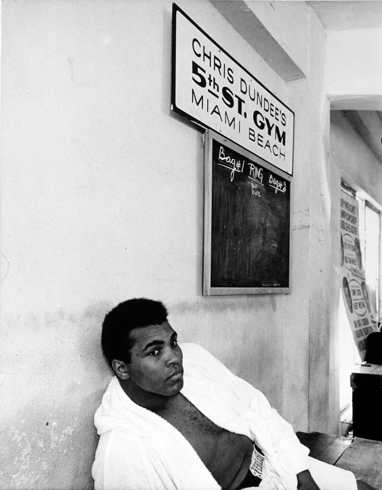 Muhammad Ali, on bench, c.1970
