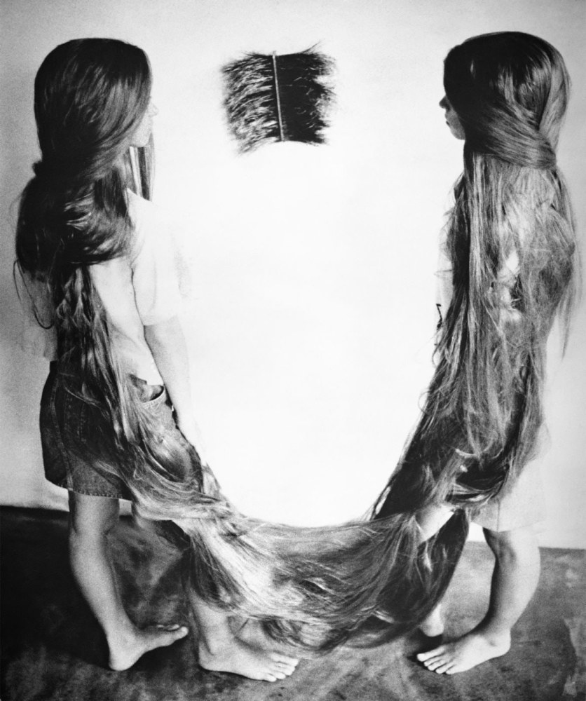 two girls with long hair