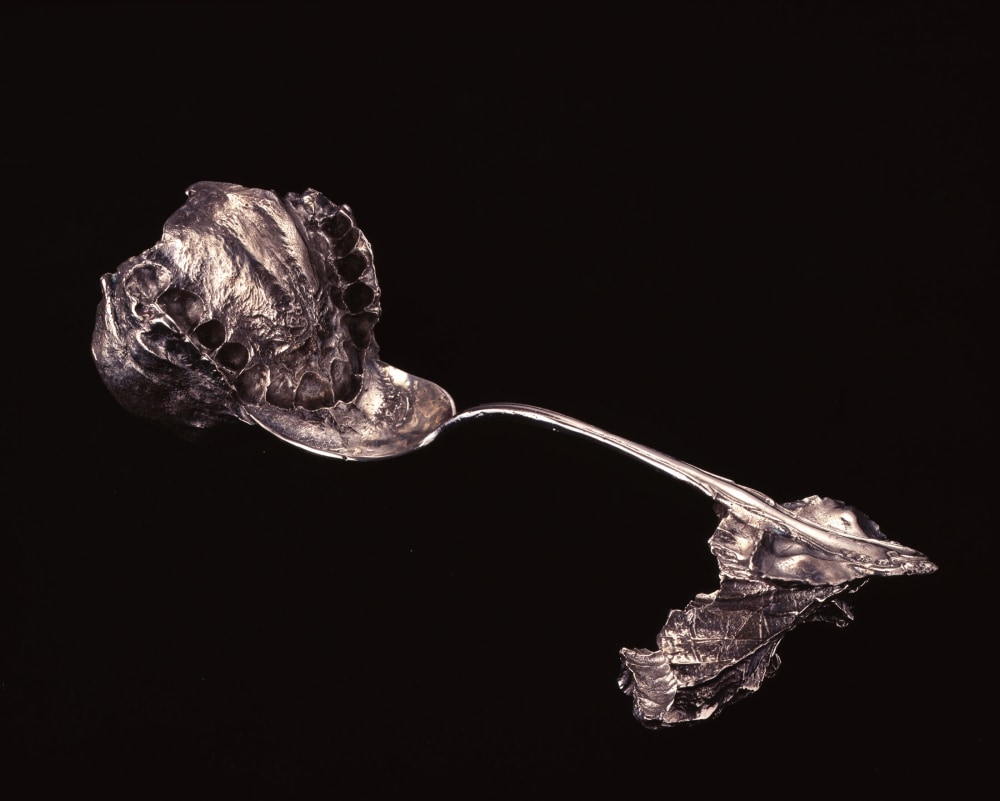 Janine Antoni, Umbilical, 2000, Sterling silver cast of family silverware and negative impression of artist&amp;#39;s mouth and mother&amp;#39;s hand, 8 x 3 x 3 inches (20.32 x 7.62 x 7.62 cm),&amp;nbsp;Edition of 35 and 6 APs
&amp;nbsp;