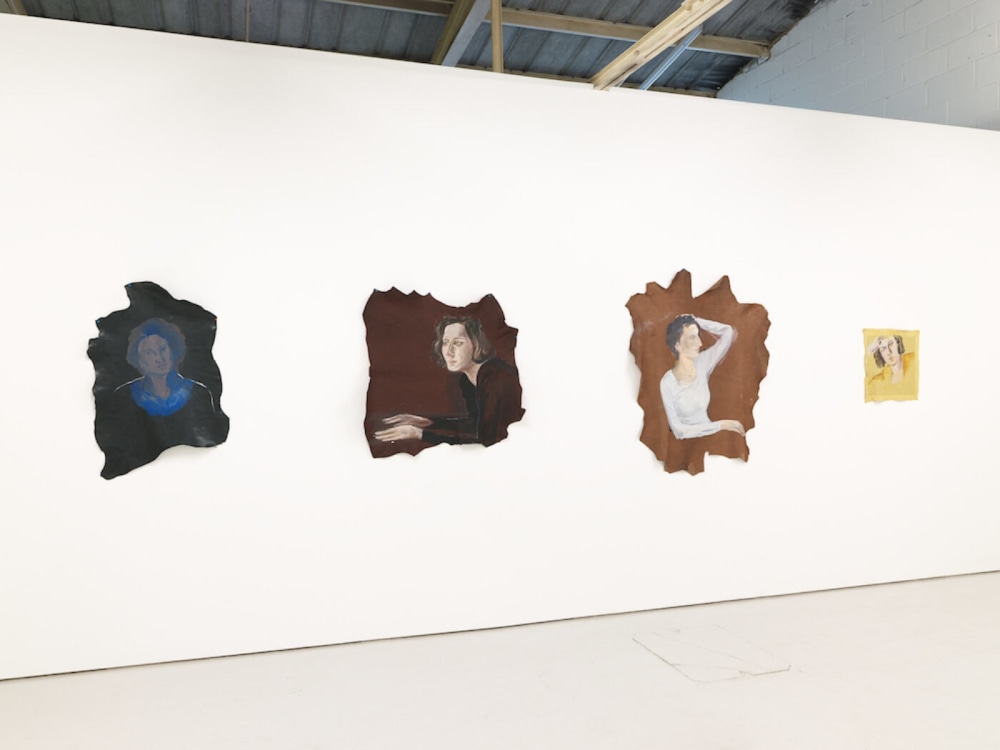 Installation of 4 portrait paintings on cloth