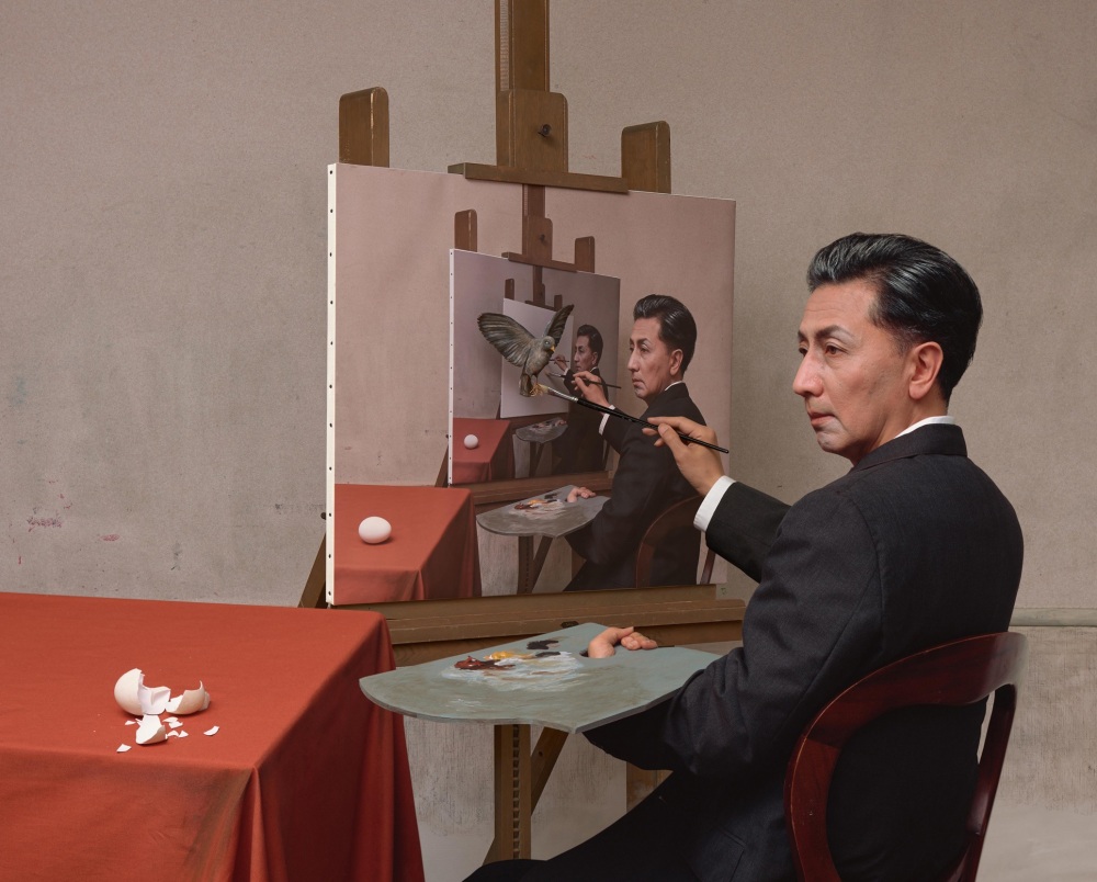 Morimura sitting at easel