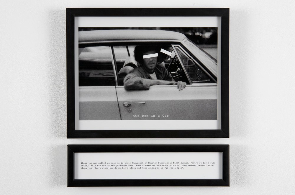 Framed black and white gelatin print by Laurie Anderson showing two men in a car