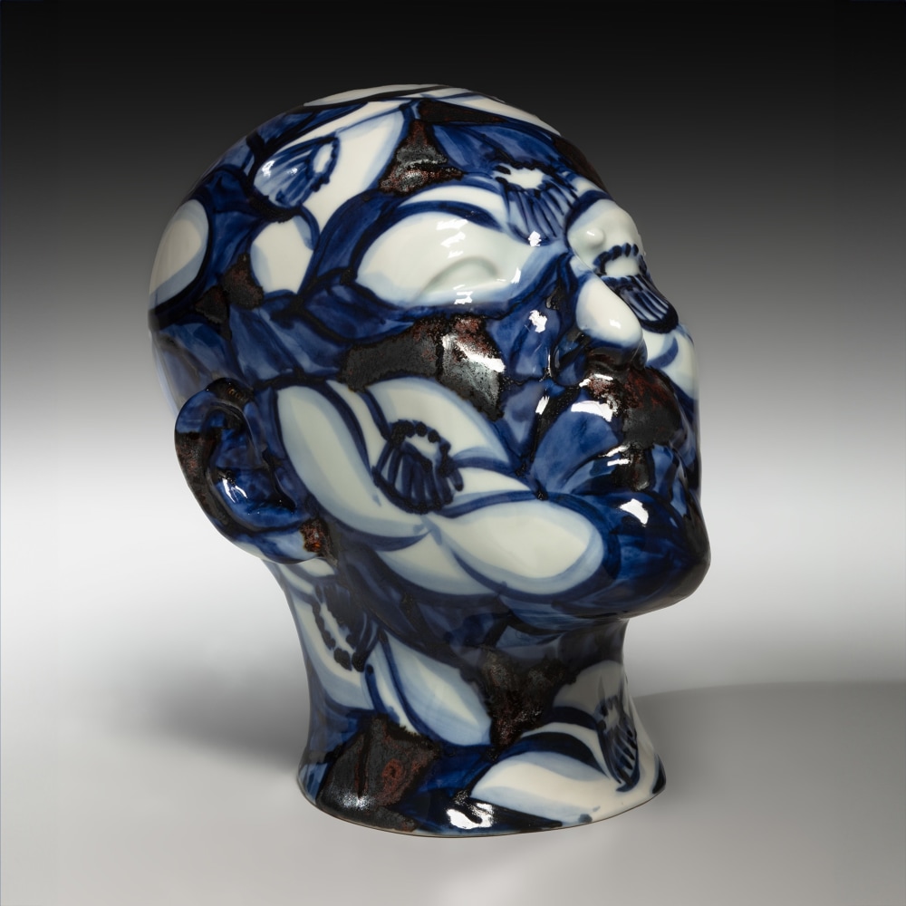 Kondō Takahiro - Mold-cast self-portrait sculpture decorated in cobalt-blue painterly camellia designs - Artworks - Joan B Mirviss LTD | Japanese Fine Art | Japanese Ceramics