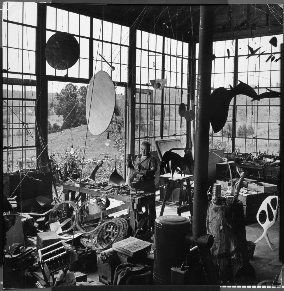 Calder with Red Disc and Gong (1940) and Untitled (c. 1940) in his Roxbury studio, 1944.&amp;nbsp;&amp;copy; 2024 Calder Foundation, New York / Artists Rights Society (ARS), New York.