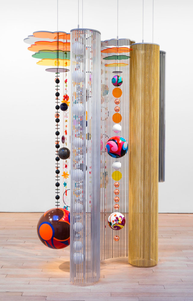 hanging sculpture of yellow and silver string along with hanging multicolor orbs