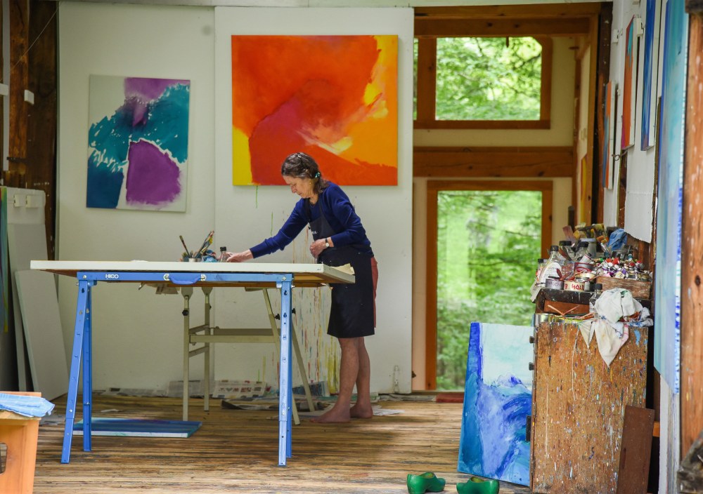 Mason working in her studio in Brattleboro, Vermont,
2018, photography by Joshua Farr.
© 2025 Emily Mason | Alice Trumbull Mason Foundation/ARS. 