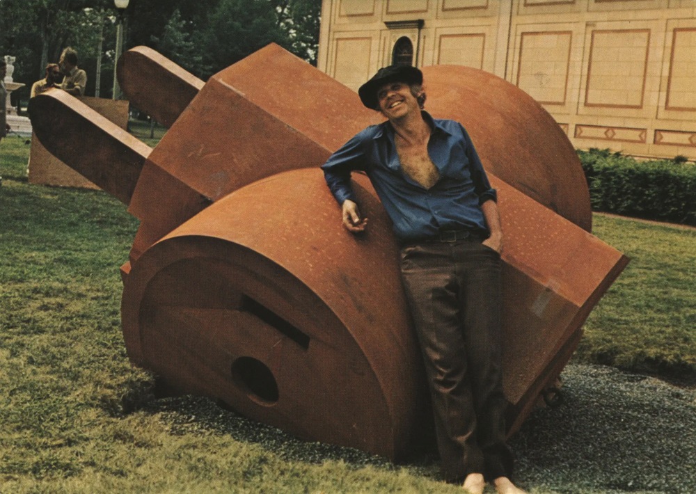 Oldenburg with ‘‘Giant Three-Way Plug’’ (1970), at  Oberlin College during installation.
