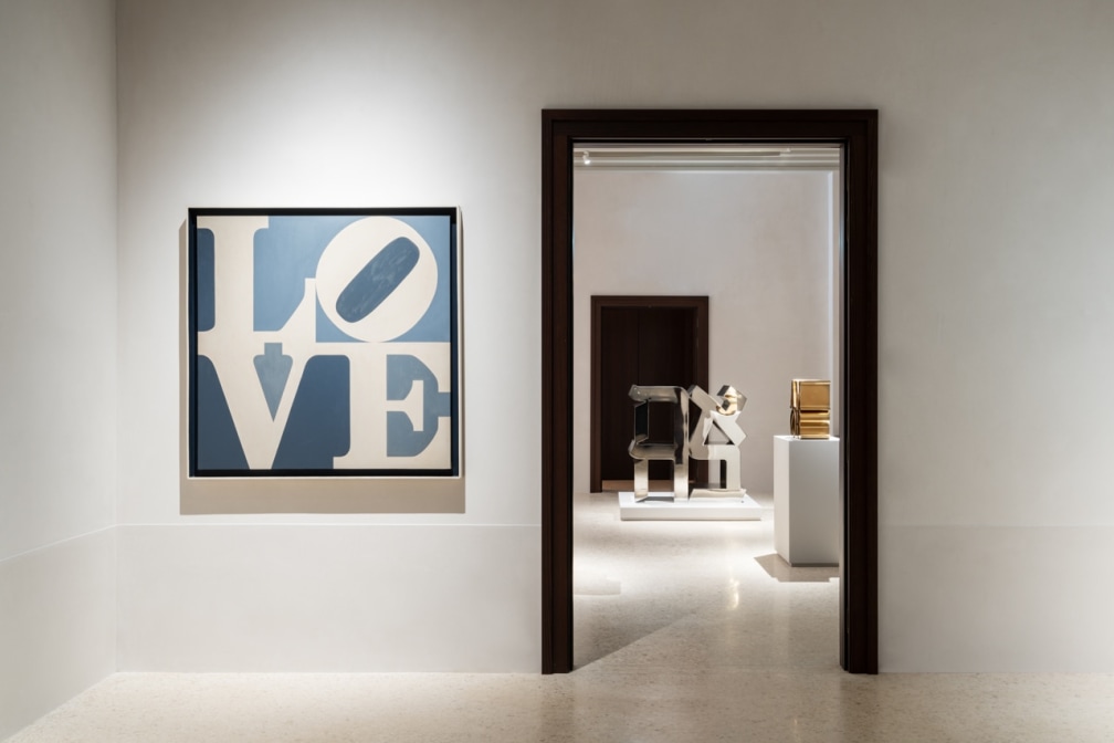 Installation view with the grey and white LOVE painting, and the sculptures AHAVA and AMOR