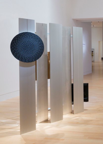 , MICHELLE GRABNER AND BRAD KILLAM, Bleacher No. 2,&nbsp;2014, Aluminum bleachers, photograph by Barry Underwood, flashe and gesso on canvas, video presented on monitor. 90 x 73 1/2 x 36 in. (228.6 x 186.7 x 91.4 cm)