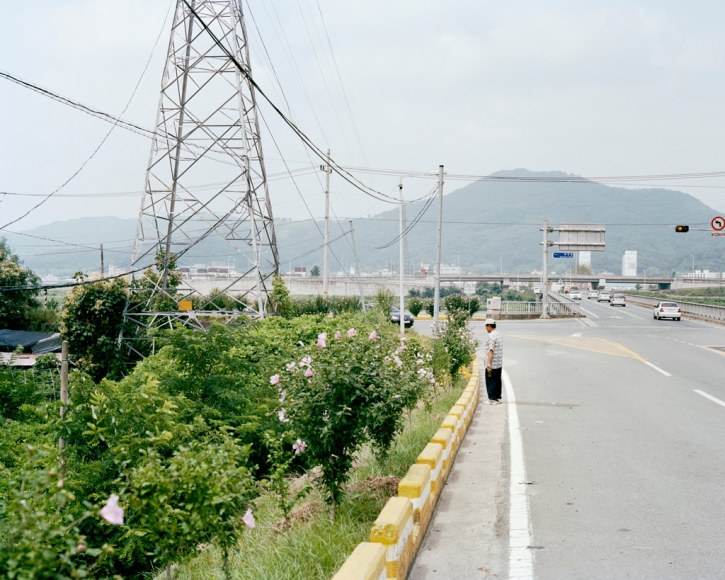 JINYOUNG KIM | GRANDFATHER WITH HIBISCUS TREES | THE FATHERS IN SANCTUARY | C-PRINT | 32 X 40 INCHES | 2012