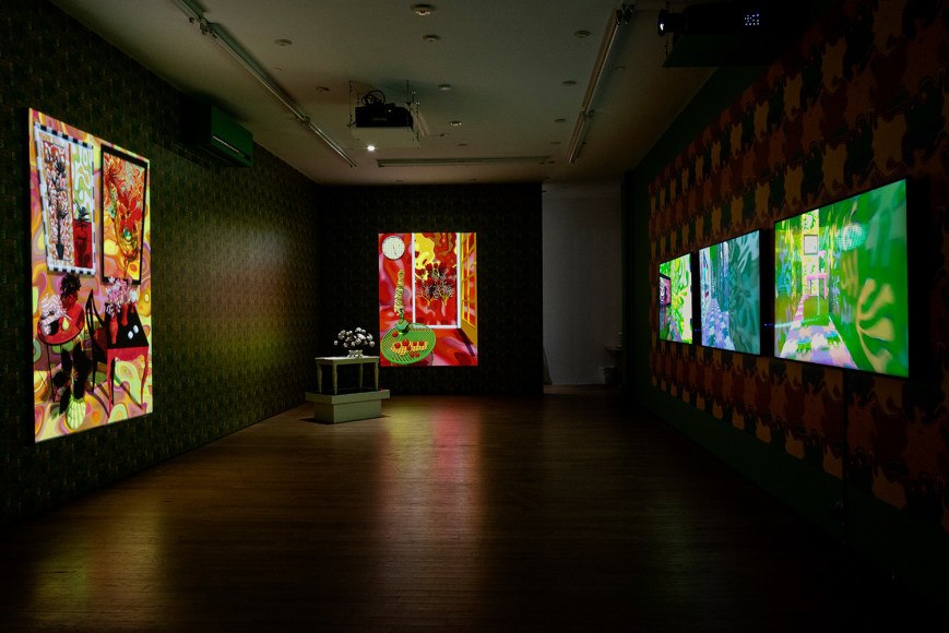The Ruins at bitforms gallery in NY, from left to right: Big Red, 2019, Video animation (color, silent), projector, stretched screen, media player, 90 x 63 x 1.5 in / 228.6 x 160 x 3.8 cm, 5 min, video loop; The Still Life With Flowers by Henri Fantin-Latour, 2019, 3D-printed resin, pigmented silicone, walnut, basswood, and maple, custom pine and Plexiglass pedestal, 34 x 29.5 x 19 in / 86.4 x 74.9 x 48.3 cm, sculpture, 48 x 36.5 x 24.5 in / 121.9 x 92.7 x 62.2 cm, overall with bases; The Green Table, 2020, Video animation (color, silent), projector, stretched screen, media player, 90 x 66.5 x 1.5 in / 228.6 x 168.9 x 3.8 cm, 5 min, video loop, Joyful Noise, 2020, Custom augmented-reality wallpaper, custom augmented-reality software application, tablet, dimensions variable; The Ruins, 2020. Three-channel video animation (color, sound), three screens or projectors, three media players, speakers, dimension variable 10 min, loop