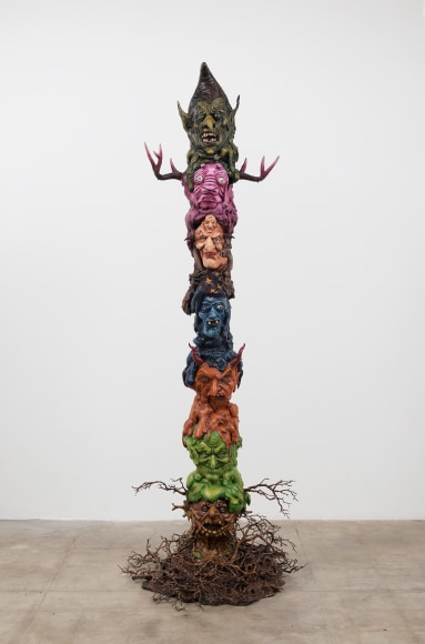 Witch Totem, 2016, Halloween masks, glass eyes, expanding foam, magi-sculpt, polyurethane horns, polyurethane branches, resin, acrylic paint, metal base, wooden pole