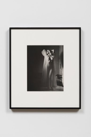 Bunny in transparent nightgown with breasts exposed, 1965