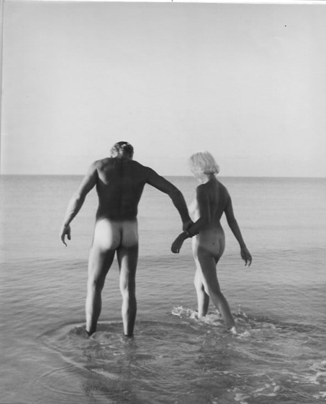Bunny Yeager, Emile Hott and Lori Shea walking in the Surf at Naples, FL, 1954