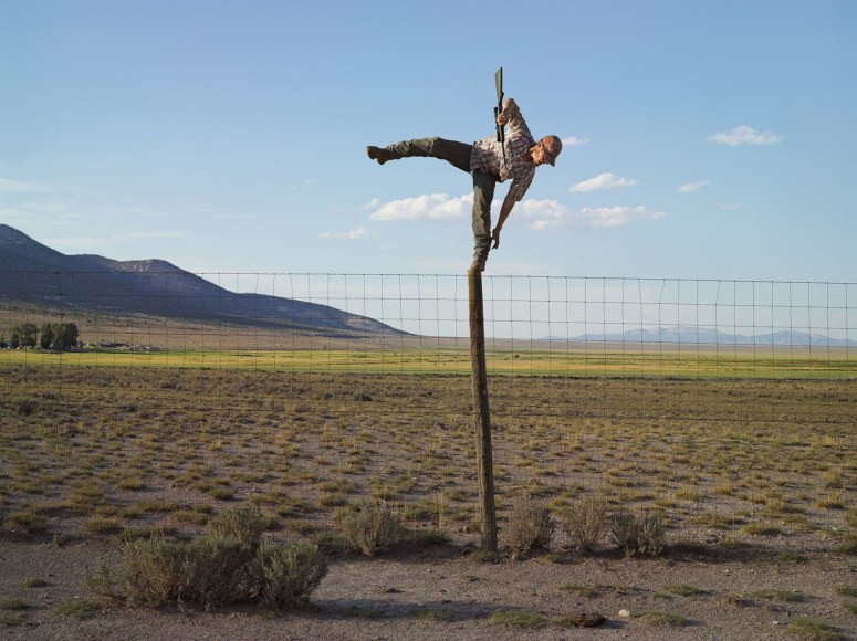 Lucas Foglia, Tommy Trying to Shoot Coyotes, Big Springs Ranch, Oasis, Nevada, 2012