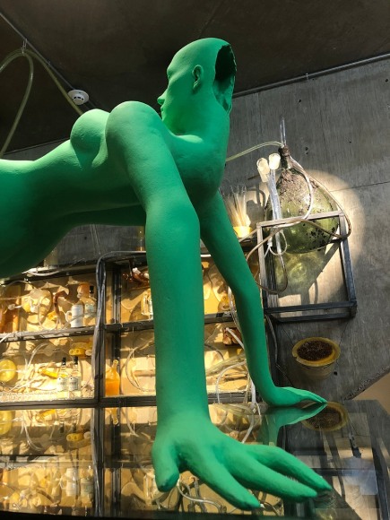 Richard Hoeck and Paul Renner installation reclining humanoid sculpture and chemistry set