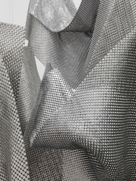 Detail view of Object for Reflection, 2016, punched aluminum and stainless steel rings