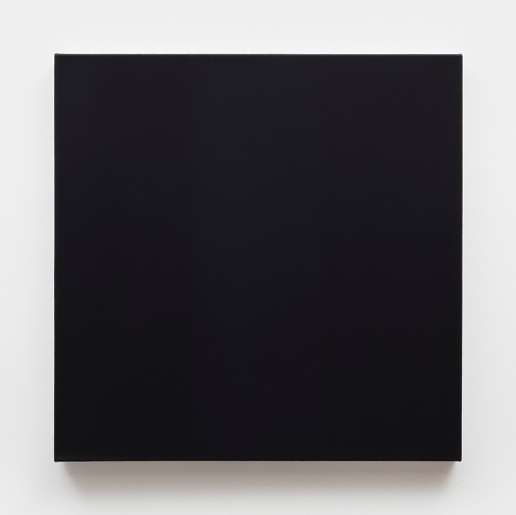 Painting of black square hanging on white wall