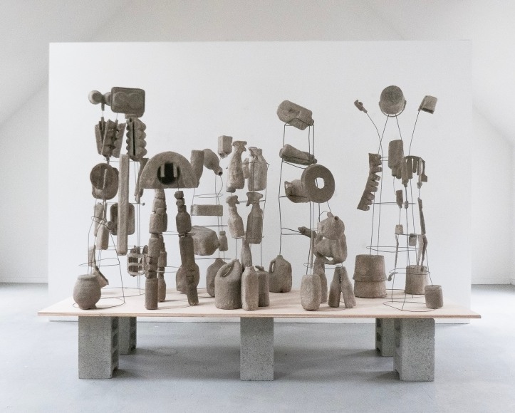 Erin Woodbrey  The Carrier Bag Series, 2024,  Single-use plastic, metal, and paper containers, foam, ash, plaster, and gauze  Variable Dimensions