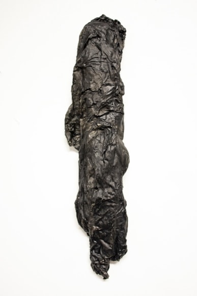 Erin Woodbrey  Fragment (Work T-Shirt), 2018  India ink on fired porcelain formed from fabric and wood  48.26 x 12.70 x 5.08 cm / 19 x 5 x 2 in