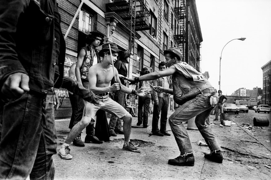 Jean- Pierre Laffont, Savage Skulls playing fights on sidewalk, Turbulent America, Sous Les Etoiles Gallery