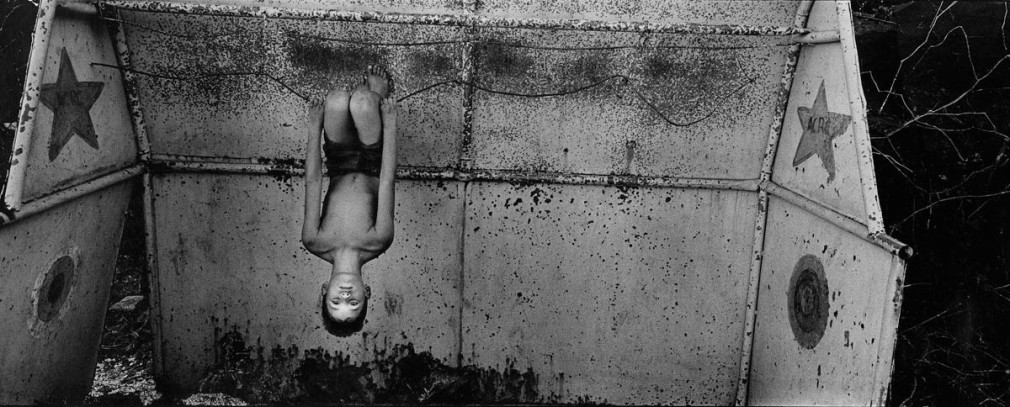 Boy hanging upside down, Trinidad, 2005 - Isla Series by Ernesto Bazan | Fine Art Photography