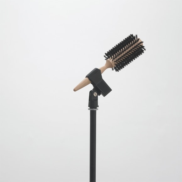 Ceal Floyer, Solo (detail), 2006, microphone stand, microphone holder, hairbrush, 54 3/8 &times; 25 1/4 &times; 25 1/4&quot;.