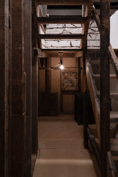 Installation view of Mike Nelson, The Deliverance and, The Patience, 2001. Various materials. Various materials. Photo: Matt Greenwood. Courtesy the artist and the Hayward Gallery.