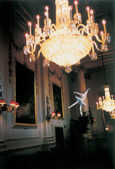 Karen Kilimnik, the electricity fairy (on the potted palm) lights up the crush room for the party, 2000