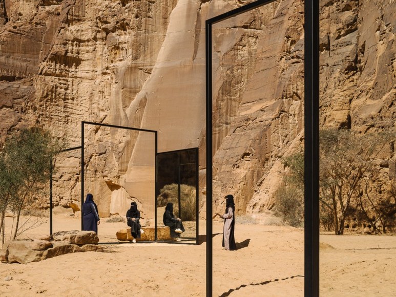 Alicja Kwade, In Blur, 2022, powdered coated steel, mirror, stones, trees and other natural elements. Installation view: Desert X AlUla, 2022. Photo by Lance Gerber. , 
