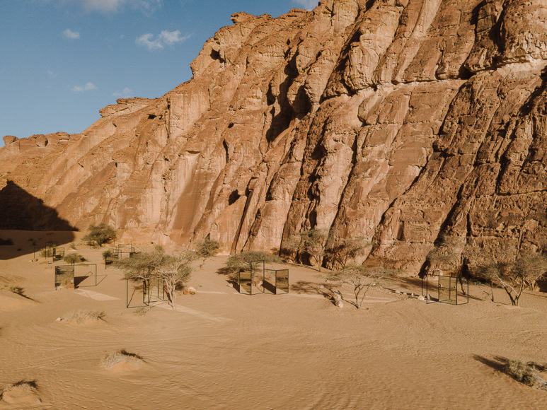 Alicja Kwade, In Blur, 2022, powdered coated steel, mirror, stones, trees and other natural elements. Installation view: Desert X AlUla, 2022. Photo by Lance Gerber. , 