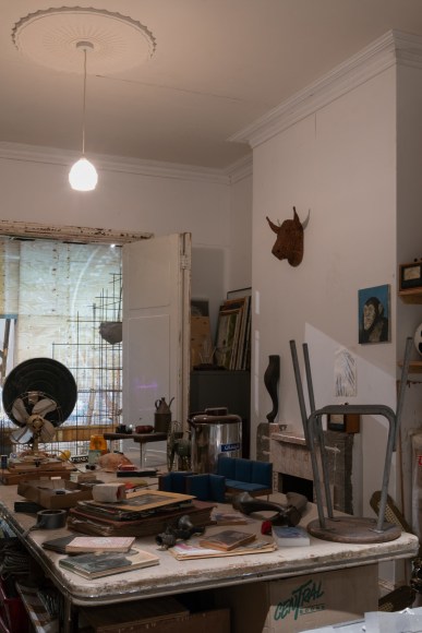 Installation view of Mike Nelson, Triple Bluff Canyon (the projection room), 2004. Various materials., Photo: Matt Greenwood. Courtesy the artist and the Hayward Gallery.