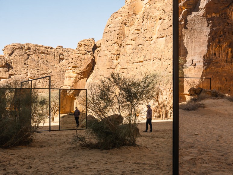 Alicja Kwade, In Blur, 2022, powdered coated steel, mirror, stones, trees and other natural elements. Installation view: Desert X AlUla, 2022. Photo by Lance Gerber. , 