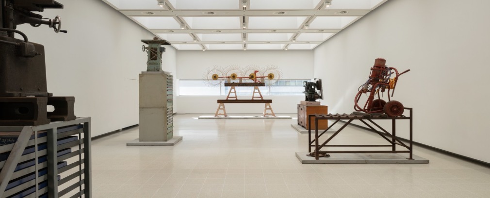 Installation view of Mike Nelson, The Asset Strippers, 2019. Various materials. Photo: Matt Greenwood., Courtesy the artist and the Hayward Gallery.
