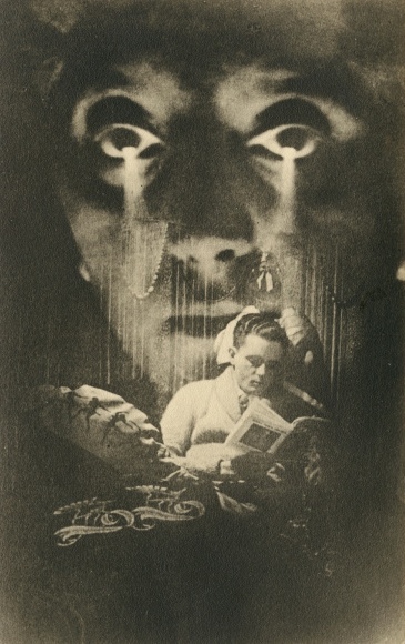 Black and white image of a man reading a book, with a large superimposed face of a woman looming over him.