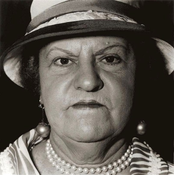 Diane Arbus: A woman with pearl necklace and earrings, N.Y.C, 1967