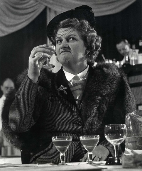 Larry Burrows, British bartenders convention...Housewife tries &quot;Mine Host,&quot; based on scotch, sherry, vermouth.  ​Published in LIFE Magazine March 19, 1951.
