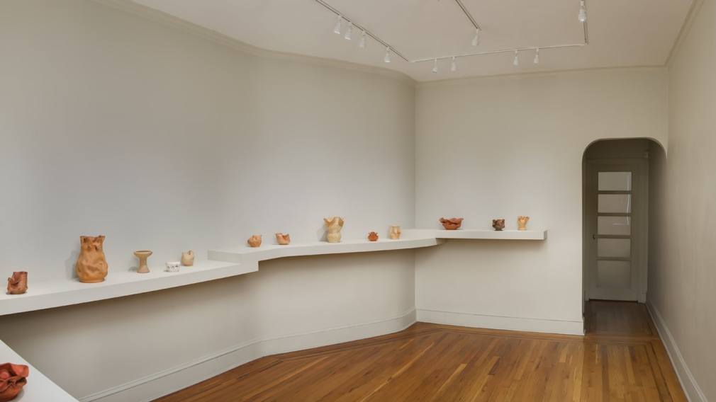 Installation view of George Ohr Pottery: No Two Alike on view at Craig F. Starr Gallery