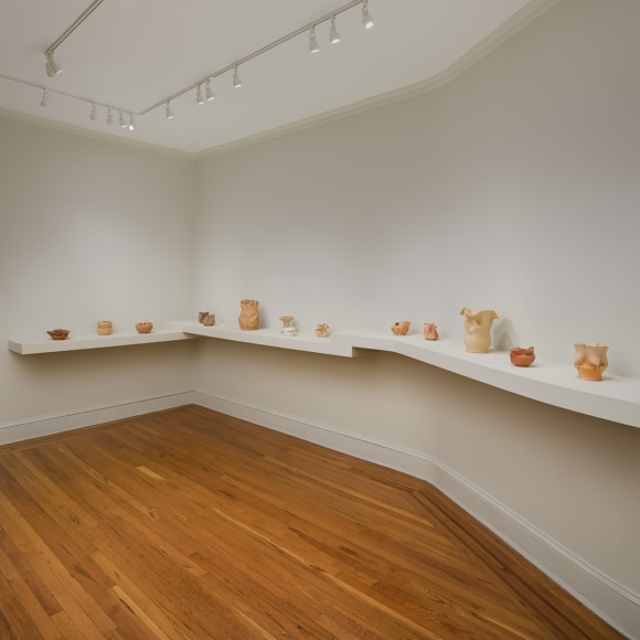 Installation view of George Ohr Pottery: No Two Alike on view at Craig F. Starr Gallery