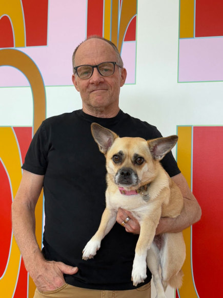 Aaron Parazette with Coco