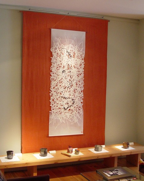 Washi paper works by Hiro Odaira, of Precious Pieces, create dividers and wall accents for the gallery.