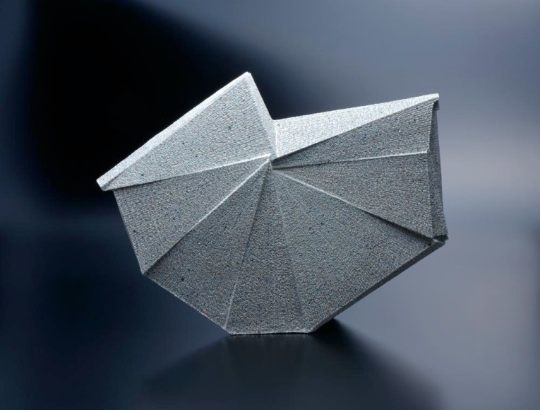 Large horizontal multi-faceted sculpture with recessed upper side, 2012