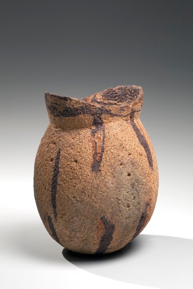 Flattened ovoid vessel with raised flaring mouth and red and purple abstract patterning, 1980s