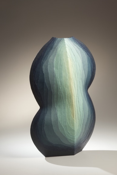 Flattened large lobed form with concentric rings of colored clay overlays, 2010
