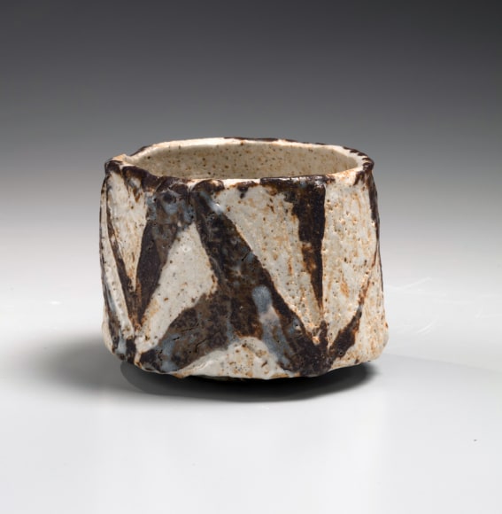 Shino straight-sided teabowl decorated with unusual carved angular patterning