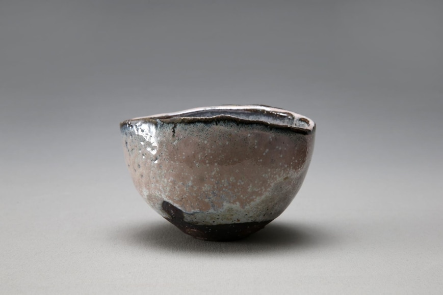 Round Hagi and ash-glazed teabowl with pink and white glaze colorations, 2014