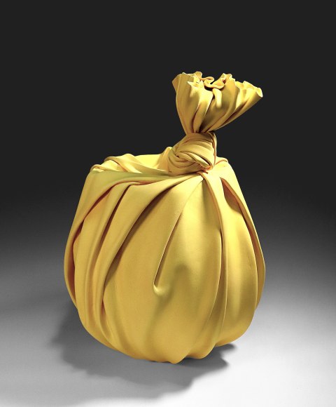 Tanaka Yū (b. 1989), Yellow sculpture in the shape of knotted furoshiki (wrapping cloth) enveloping a large Tsubo